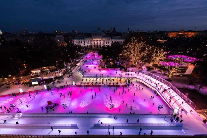 REALICE outdoor ice rink lit up at night